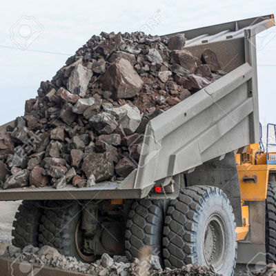 truck hauling stone